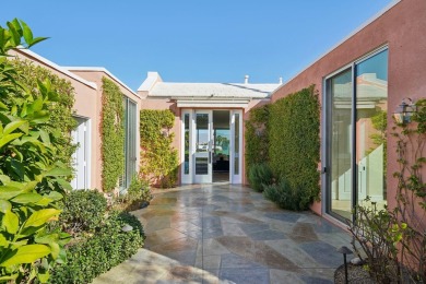 This stately John Elgin Woolf Hollywood Regency-style gem is on Marrakesh Country Club in California - for sale on GolfHomes.com, golf home, golf lot