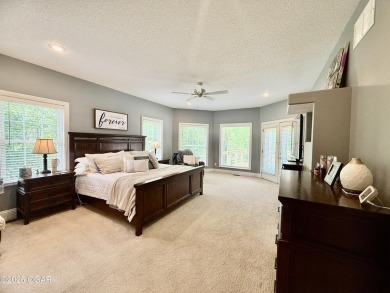Executive Style Brick Home with 5 Beds, 4.5 Baths, 3 car garage on Neosho Municipal Golf Course in Missouri - for sale on GolfHomes.com, golf home, golf lot