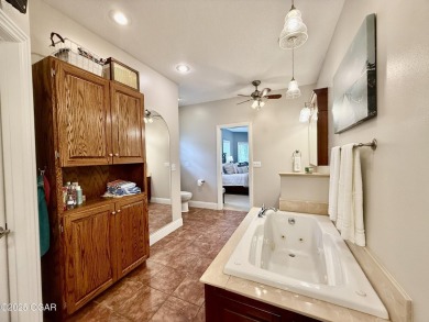 Executive Style Brick Home with 5 Beds, 4.5 Baths, 3 car garage on Neosho Municipal Golf Course in Missouri - for sale on GolfHomes.com, golf home, golf lot
