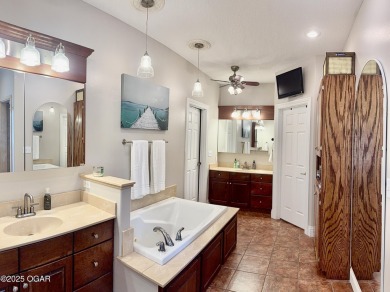 Executive Style Brick Home with 5 Beds, 4.5 Baths, 3 car garage on Neosho Municipal Golf Course in Missouri - for sale on GolfHomes.com, golf home, golf lot