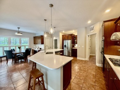 Executive Style Brick Home with 5 Beds, 4.5 Baths, 3 car garage on Neosho Municipal Golf Course in Missouri - for sale on GolfHomes.com, golf home, golf lot