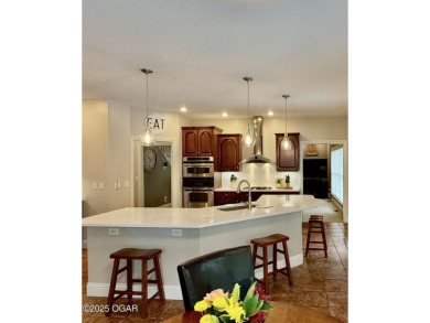 Executive Style Brick Home with 5 Beds, 4.5 Baths, 3 car garage on Neosho Municipal Golf Course in Missouri - for sale on GolfHomes.com, golf home, golf lot