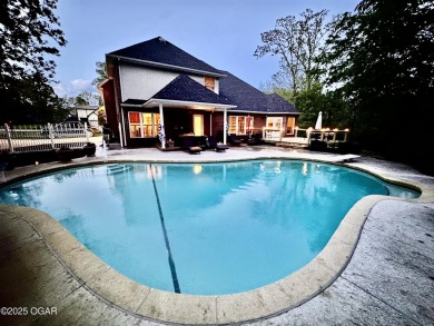 Executive Style Brick Home with 5 Beds, 4.5 Baths, 3 car garage on Neosho Municipal Golf Course in Missouri - for sale on GolfHomes.com, golf home, golf lot