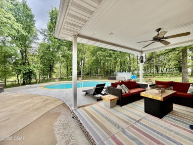 Executive Style Brick Home with 5 Beds, 4.5 Baths, 3 car garage on Neosho Municipal Golf Course in Missouri - for sale on GolfHomes.com, golf home, golf lot