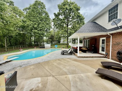 Executive Style Brick Home with 5 Beds, 4.5 Baths, 3 car garage on Neosho Municipal Golf Course in Missouri - for sale on GolfHomes.com, golf home, golf lot
