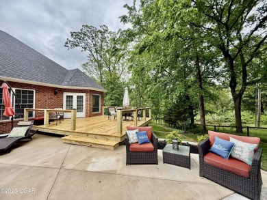 Executive Style Brick Home with 5 Beds, 4.5 Baths, 3 car garage on Neosho Municipal Golf Course in Missouri - for sale on GolfHomes.com, golf home, golf lot