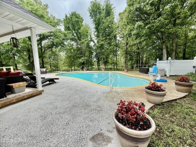Executive Style Brick Home with 5 Beds, 4.5 Baths, 3 car garage on Neosho Municipal Golf Course in Missouri - for sale on GolfHomes.com, golf home, golf lot
