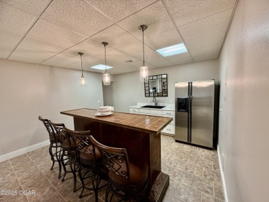 Executive Style Brick Home with 5 Beds, 4.5 Baths, 3 car garage on Neosho Municipal Golf Course in Missouri - for sale on GolfHomes.com, golf home, golf lot