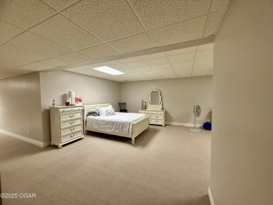 Executive Style Brick Home with 5 Beds, 4.5 Baths, 3 car garage on Neosho Municipal Golf Course in Missouri - for sale on GolfHomes.com, golf home, golf lot