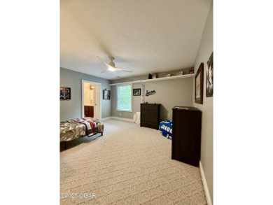 Executive Style Brick Home with 5 Beds, 4.5 Baths, 3 car garage on Neosho Municipal Golf Course in Missouri - for sale on GolfHomes.com, golf home, golf lot