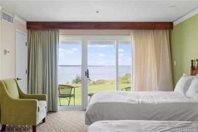 Experience breathtaking waterfront and sunset views of the James on Kingsmill Resort and Golf Club in Virginia - for sale on GolfHomes.com, golf home, golf lot