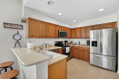 First-floor Partiallty Furnished carriage home in Crown Colony on Crown Colony Golf and Country Club in Florida - for sale on GolfHomes.com, golf home, golf lot