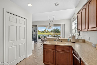 First-floor Partiallty Furnished carriage home in Crown Colony on Crown Colony Golf and Country Club in Florida - for sale on GolfHomes.com, golf home, golf lot