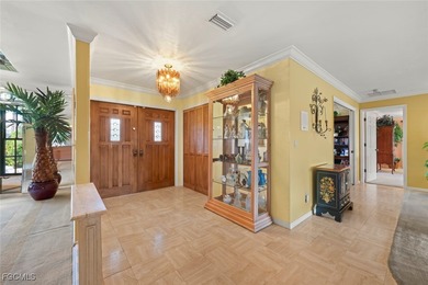 Over 3,200 sq ft of living in this 4 bedroom, 3 bath on Fiddlesticks Country Club in Florida - for sale on GolfHomes.com, golf home, golf lot