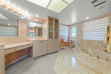 Over 3,200 sq ft of living in this 4 bedroom, 3 bath on Fiddlesticks Country Club in Florida - for sale on GolfHomes.com, golf home, golf lot