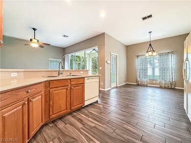 Welcome to Cypress Cay at Gateway! This well-maintained on Gateway Golf and Country Club in Florida - for sale on GolfHomes.com, golf home, golf lot