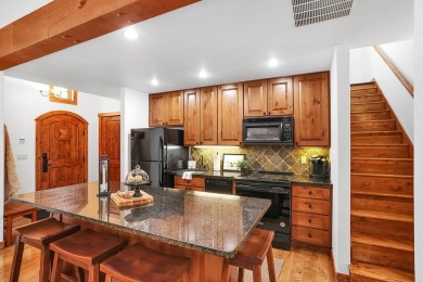 Tucked beneath mature trees for just the right amount of privacy on Osprey Meadows at Tamarack Resort in Idaho - for sale on GolfHomes.com, golf home, golf lot