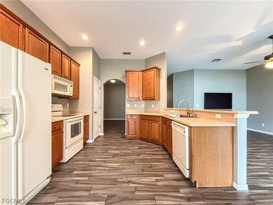 Welcome to Cypress Cay at Gateway! This well-maintained on Gateway Golf and Country Club in Florida - for sale on GolfHomes.com, golf home, golf lot