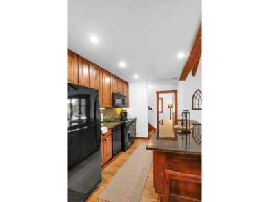 Tucked beneath mature trees for just the right amount of privacy on Osprey Meadows at Tamarack Resort in Idaho - for sale on GolfHomes.com, golf home, golf lot