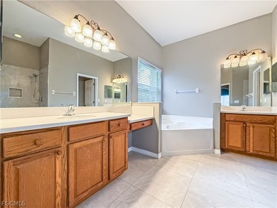 Welcome to Cypress Cay at Gateway! This well-maintained on Gateway Golf and Country Club in Florida - for sale on GolfHomes.com, golf home, golf lot