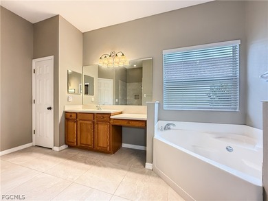 Welcome to Cypress Cay at Gateway! This well-maintained on Gateway Golf and Country Club in Florida - for sale on GolfHomes.com, golf home, golf lot