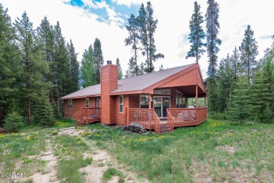 This turnkey furnished 3bd/2bath Ranch sits on a full third acre on Grand Lake Golf Course in Colorado - for sale on GolfHomes.com, golf home, golf lot