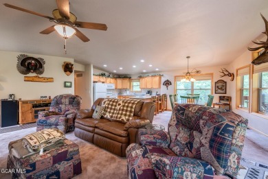 This turnkey furnished 3bd/2bath Ranch sits on a full third acre on Grand Lake Golf Course in Colorado - for sale on GolfHomes.com, golf home, golf lot