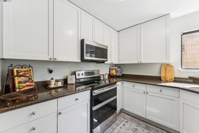Discover this stunning, upgraded 2-bedroom, 2-bath top-floor end on The Bridges Golf Club in California - for sale on GolfHomes.com, golf home, golf lot