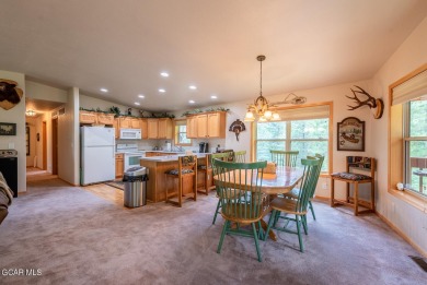 This turnkey furnished 3bd/2bath Ranch sits on a full third acre on Grand Lake Golf Course in Colorado - for sale on GolfHomes.com, golf home, golf lot