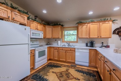 This turnkey furnished 3bd/2bath Ranch sits on a full third acre on Grand Lake Golf Course in Colorado - for sale on GolfHomes.com, golf home, golf lot