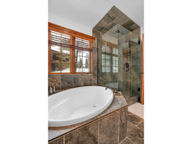 Tucked beneath mature trees for just the right amount of privacy on Osprey Meadows at Tamarack Resort in Idaho - for sale on GolfHomes.com, golf home, golf lot