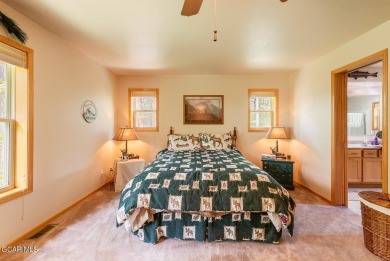 This turnkey furnished 3bd/2bath Ranch sits on a full third acre on Grand Lake Golf Course in Colorado - for sale on GolfHomes.com, golf home, golf lot