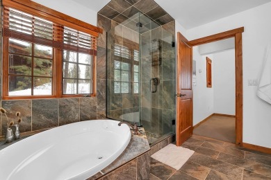 Tucked beneath mature trees for just the right amount of privacy on Osprey Meadows at Tamarack Resort in Idaho - for sale on GolfHomes.com, golf home, golf lot