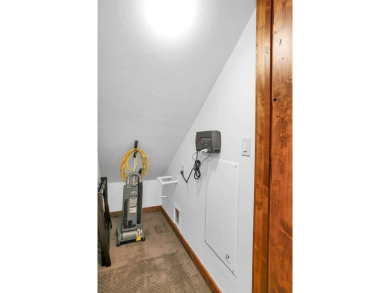 Tucked beneath mature trees for just the right amount of privacy on Osprey Meadows at Tamarack Resort in Idaho - for sale on GolfHomes.com, golf home, golf lot