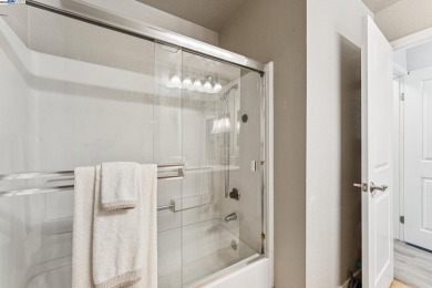Discover this stunning, upgraded 2-bedroom, 2-bath top-floor end on The Bridges Golf Club in California - for sale on GolfHomes.com, golf home, golf lot