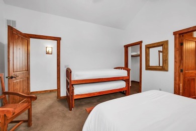 Tucked beneath mature trees for just the right amount of privacy on Osprey Meadows at Tamarack Resort in Idaho - for sale on GolfHomes.com, golf home, golf lot
