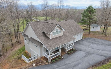 Situated in the heart of Clay County, this pristine 4-bedroom on Chatuge Shores Golf Course in North Carolina - for sale on GolfHomes.com, golf home, golf lot
