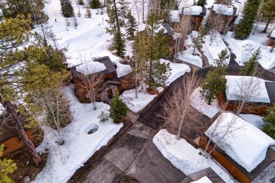 Tucked beneath mature trees for just the right amount of privacy on Osprey Meadows at Tamarack Resort in Idaho - for sale on GolfHomes.com, golf home, golf lot