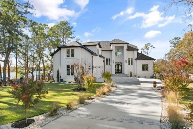 Experience the ultimate in lakefront luxury with this on Oyster Bay Golf Links in South Carolina - for sale on GolfHomes.com, golf home, golf lot