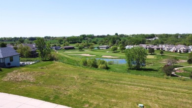 Great walkout lot in Whispering Creek Estates with vast views of on Whispering Creek Golf Club in Iowa - for sale on GolfHomes.com, golf home, golf lot