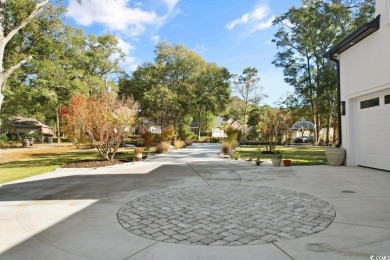 Experience the ultimate in lakefront luxury with this on Oyster Bay Golf Links in South Carolina - for sale on GolfHomes.com, golf home, golf lot
