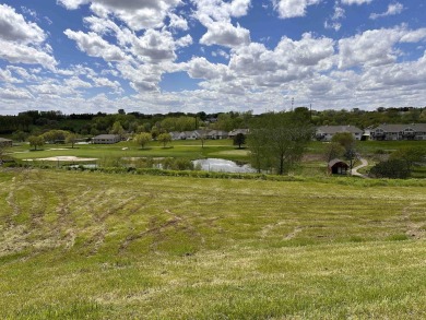 Great walkout lot in Whispering Creek Estates with vast views of on Whispering Creek Golf Club in Iowa - for sale on GolfHomes.com, golf home, golf lot