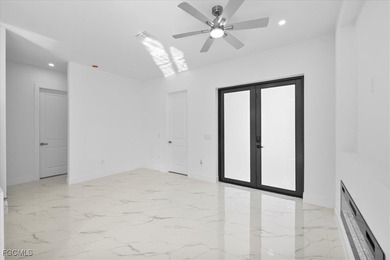 Corner lot new construction offering 3 bedrooms and 2 bathrooms on Lehigh Resort Club in Florida - for sale on GolfHomes.com, golf home, golf lot