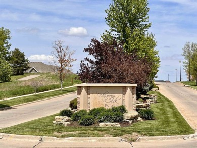 Great walkout lot in Whispering Creek Estates with vast views of on Whispering Creek Golf Club in Iowa - for sale on GolfHomes.com, golf home, golf lot