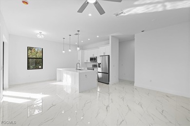 Corner lot new construction offering 3 bedrooms and 2 bathrooms on Lehigh Resort Club in Florida - for sale on GolfHomes.com, golf home, golf lot