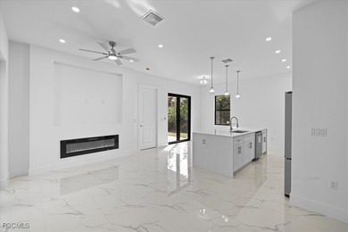 Corner lot new construction offering 3 bedrooms and 2 bathrooms on Lehigh Resort Club in Florida - for sale on GolfHomes.com, golf home, golf lot