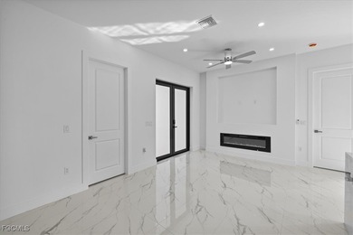 Corner lot new construction offering 3 bedrooms and 2 bathrooms on Lehigh Resort Club in Florida - for sale on GolfHomes.com, golf home, golf lot