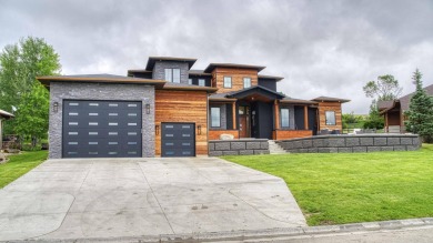 Step into luxury with this stunning modern smart home located in on The Powder Horn Golf Club - Mountain in Wyoming - for sale on GolfHomes.com, golf home, golf lot