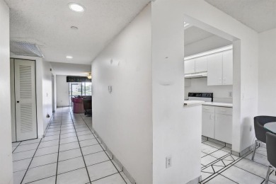 Enjoy lakefront living in the newest section of Century Village on Flamingo Lakes Country Club in Florida - for sale on GolfHomes.com, golf home, golf lot