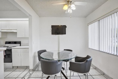 Enjoy lakefront living in the newest section of Century Village on Flamingo Lakes Country Club in Florida - for sale on GolfHomes.com, golf home, golf lot